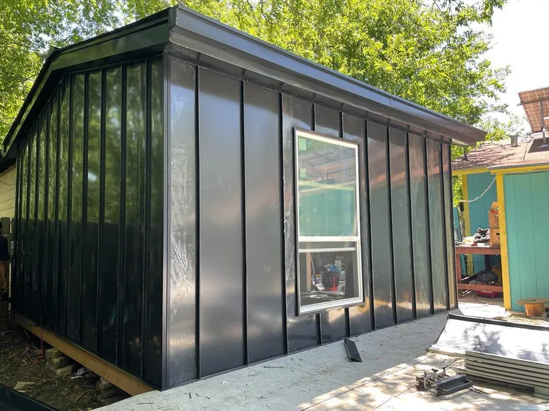 Black standing seam metal wall panels for Metal Roof Installation in Aventura